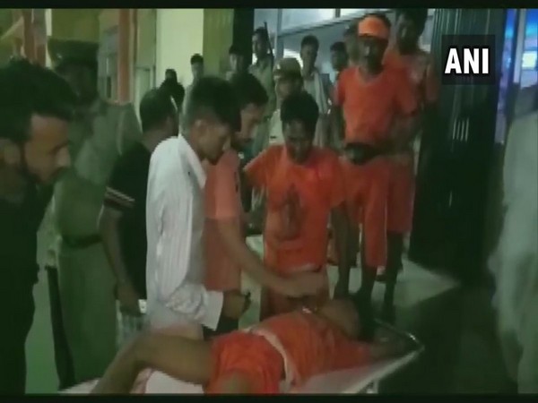 An injured Kanwariya being shifted to hospital. (Photo/ANI)