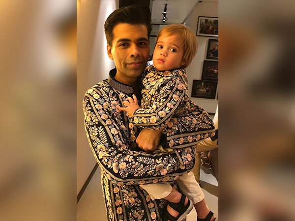 Karan Johar and his son Yash (Image source: Twitter)