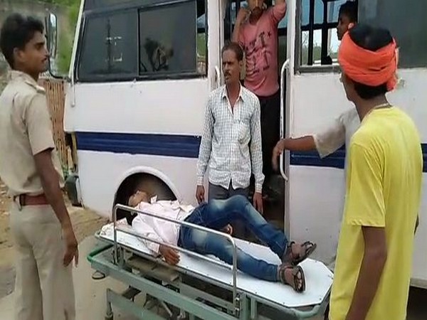 An injured being taken to the hospital after a bus overturned in Karauli on Tuesday (photo/ANI)