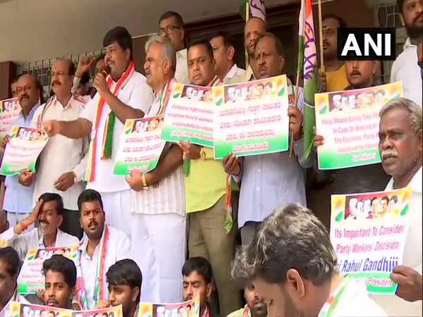 Visuals of Congress party workers' demonstration outside party office in Karnataka. Photo: ANI.