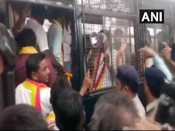 Karnataka Rakshan Vedike members being detained by police in Belagavi on Wednesday. (Photo/ANI)
