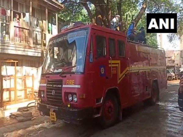 Karnataka State Fire and Emergency Services Department conducts a disinfection drive in Hubli amid lockdown. Photo/ ANI
