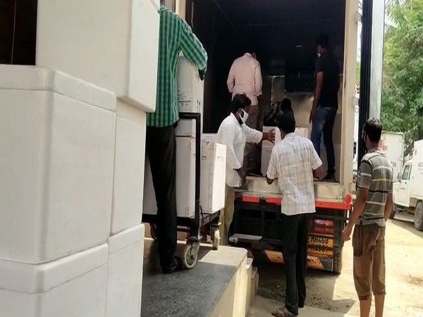 Transporting Covishield vaccine doses to state storage centre at Gannavaram