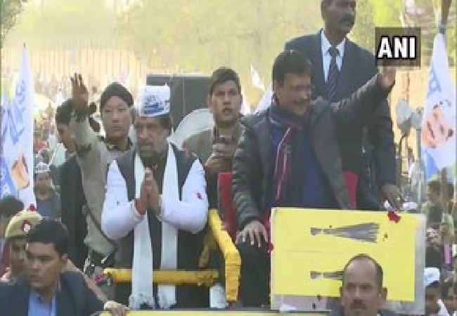 Delhi Chief Minister Arvind Kejriwal in a roadshow in Badarpur, Delhi on Friday.