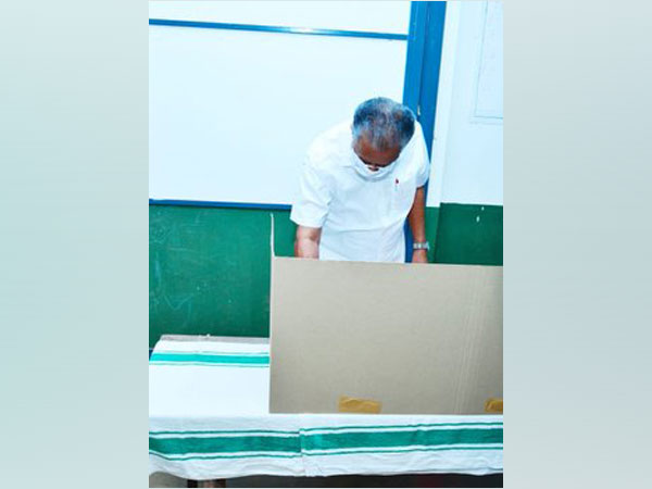 Kerala Chief Minister Pinarayi Vijayan casting his vote in local body polls in Kannur on Monday. 