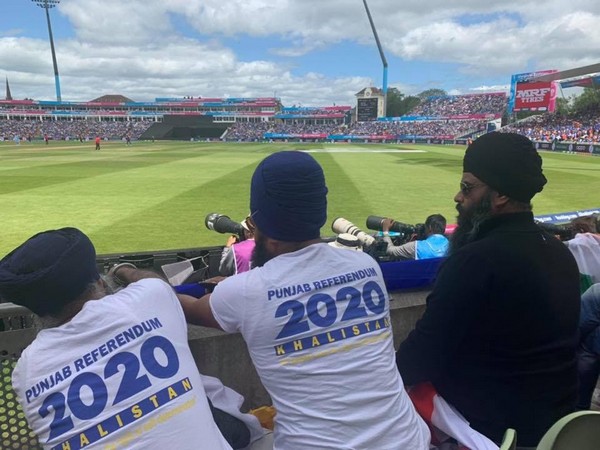 Khalistan supporters sit among the crowd during an ICC cricket world cup match