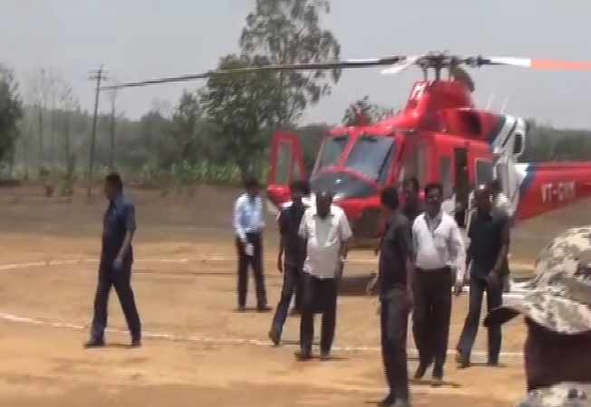 A flying squad of the Election Commission conducting search inside helicopter of Karnataka chief minister HD Kumaraswamy in Shivamogga on Wednesday Photo/ANI