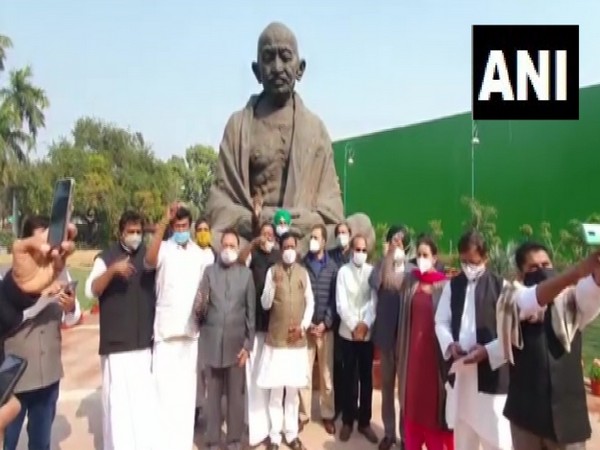 Rahul Gandhi (Blue jacket)and Congress MPs protesting against farm laws in the Parliament's premises