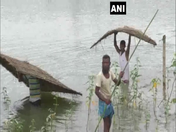 People affected due to flood at Lakhimpur in Assam on Friday