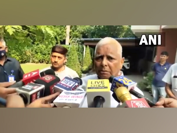 RJD leader Lalu Prasad Yadav speaking to reporters in Delhi on Sunday (Photo/ANI)
