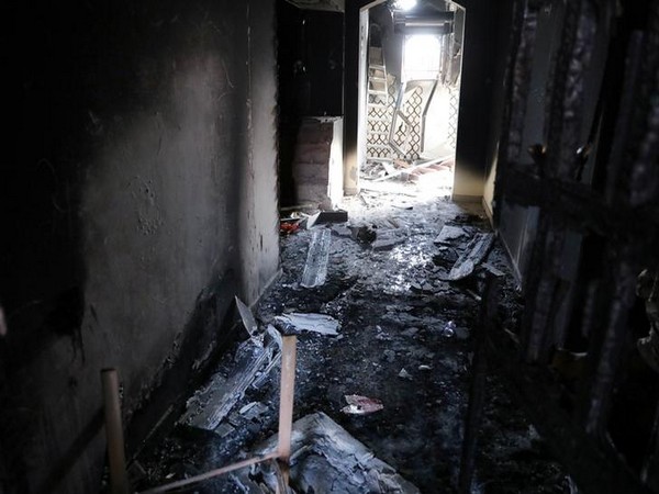 A building destroyed due to armed clashes in Tripoli on Oct 14 (Photo/Reuters)