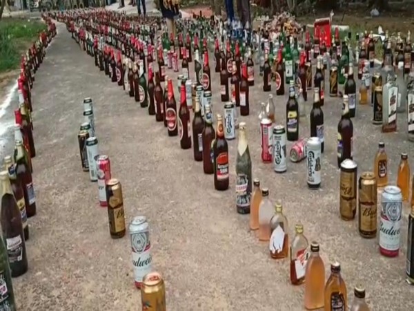 Illegal liquor bottles seized by Andhra Police. (Photo/ANI)