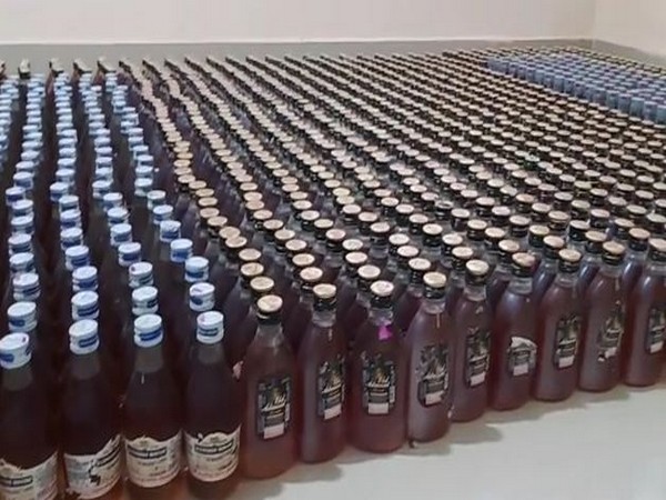 A total of 1,460 bottles of three different brands were seized by the Andhra Pradesh police. [Photo/ANI]