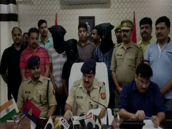 Lucknow Police with the accused.