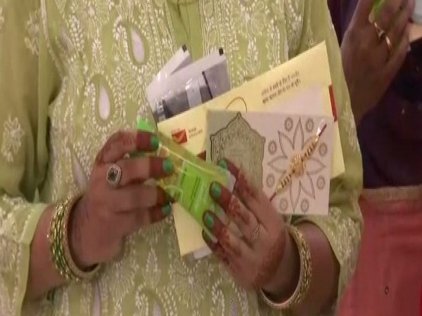 Women sending sanitiser, masks etc. with Rakhi at GPO Lucknow