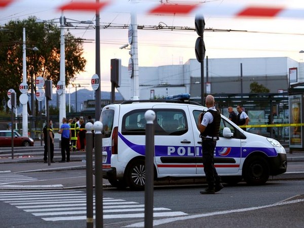 French police standing outside subway stop where knife attack took place on Saturday