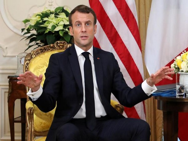 French President Macron at a joint press conference with US President Donald Trump (not pictured) in London on Tuesday.