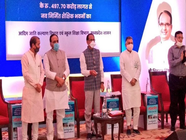 Madhya Pradesh Chief Minister Shivraj Singh Chauhan (in middle) during the event in Bhopal on Tuesday. (Photo/ANI)