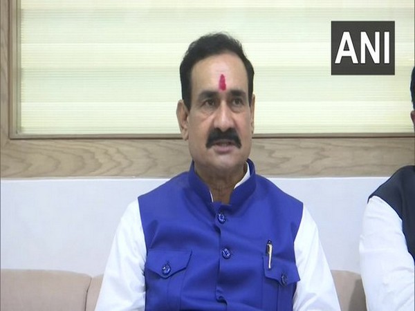 Madhya Pradesh Home Minister Narottam Mishra speaking to reporters on Friday. 