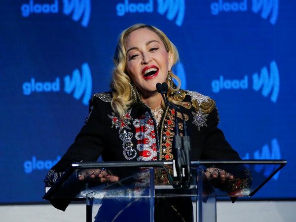 Madonna speaks to guests after receiving the Advocate for Change award during the GLAAD Media Awards