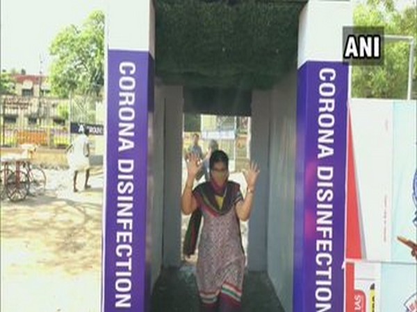 Disinfection tunnel outside the entry of Madurai College ground [Photo/ANI]