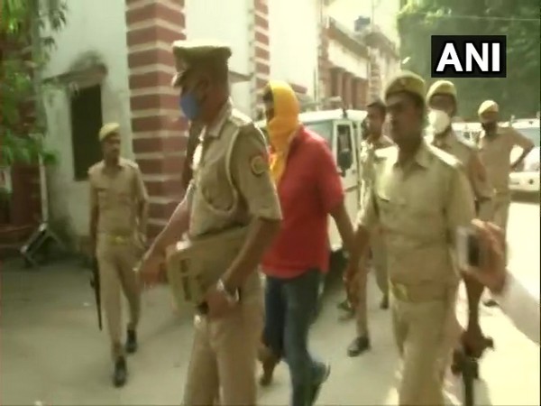 Main accused Dhirendra Singh brought back to Ballia Police Station after a medical test. (Photo/ANI)