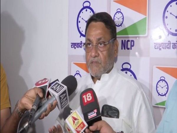 Nationalist Congress Party  chief spokesperson Nawab Malik speaks to media in Mumbai on Sunday [Photo/ANI]