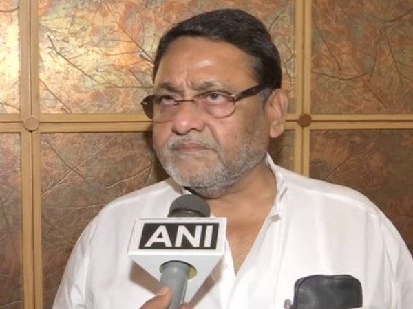 NCP spokesperson Nawab Malik speaking to ANi in Mumbai on Tuesday. (Photo/ANI)