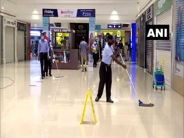 Workers sanitise a mall in Thiruvananthapuram ahead of its reopening on June 8.