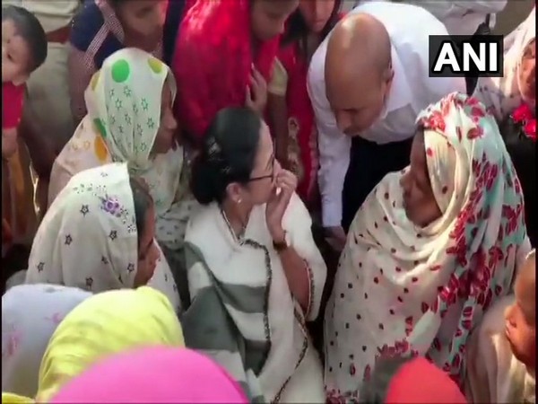 Chief Minister Mamata Banerjee meeting family members of the labourers who were killed by terrorists in Kulgam, Jammu and Kashmir last month.