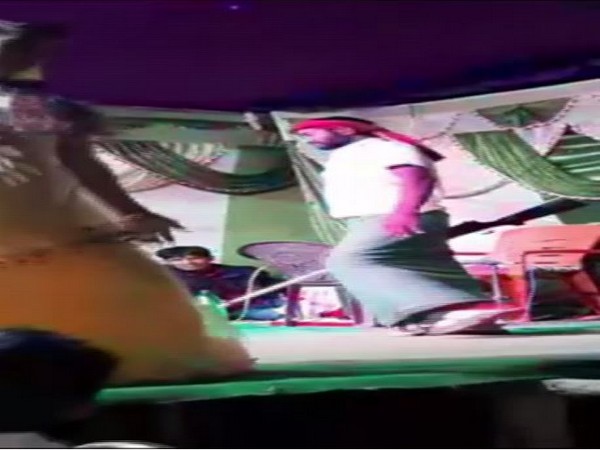 Man brandished handgun in Gaya during an event [Photo/ANI]