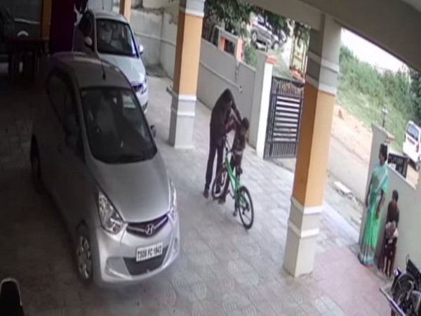 The accused thrashing the minor at an apartment parking lot in Hyderabad on November 8 