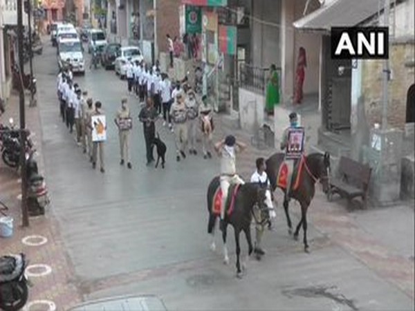 The Surat Rural Police took out awareness drive with animals,in tribal area of Mandvi in Surat district [Photo/ANI]