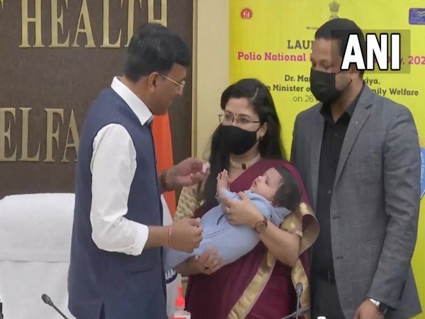 Union Health Minister Mansukh Mandaviya administering polio drops to a child. (Photo/ANI)