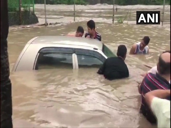 Severe waterlogging at the parking area near Panchvaktra Temple in Mandi, Himachal Pradesh on Sunday. Photo/ANI