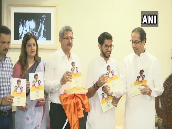Shiv Sena chief Uddhav Thackeray and Aditya Thackeray at manifesto release in Mumbai on Saturday 