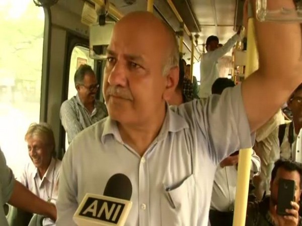 Deputy CM Manish Sisodia takes a DTC bus ride in New Delhi . Photo/ANI