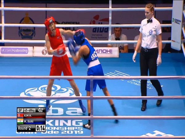 Manju Rani (Blue) punching her opponent Kim Hyang Mi (Red) during the quarterfinal bout. (Photo/Boxing Federation Twitter)