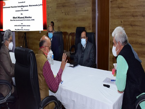 LG Manoj Sinha in conversation with other officials during the launch on Friday. [Photo: @manojsinha_/Twitter]
