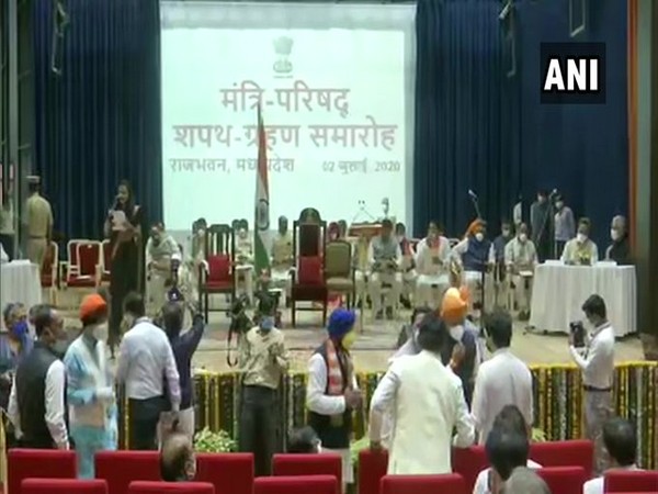 28 Ministers were administered the oath of office and secrecy by Governor Anandiben Patel at Raj Bhawan in Bhopal on Thursday. [Photo/ANI]