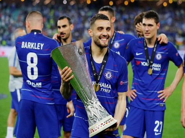 Chelsea midfielder Mateo Kovacic with Europa League trophy