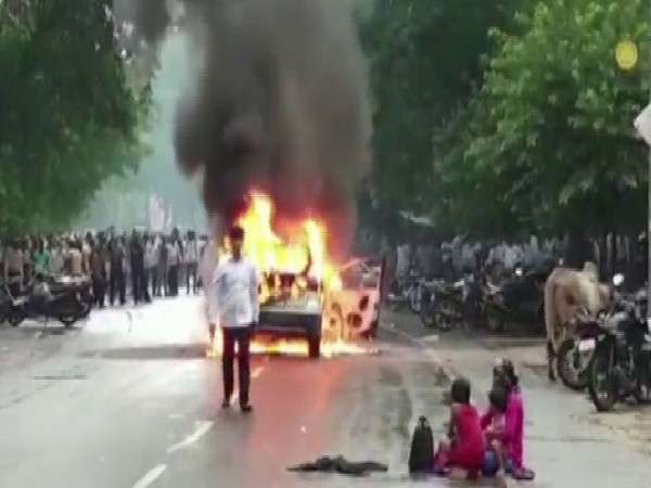 A man with pistol created a ruckus and set his own car on fire (Photo/ANI)