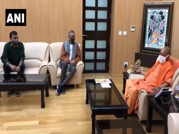 Film producer and director Prakash Jha with Uttar Pradesh Chief Minister Yogi Adityanath in Lucknow. [Photo/ANI]