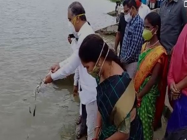 The minister released 1.76 crore fish into the village pond, as part of the programme. (Photo: ANI)