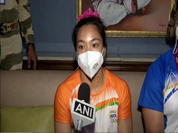 Weightlifter Mirabai Chanu after returning to India