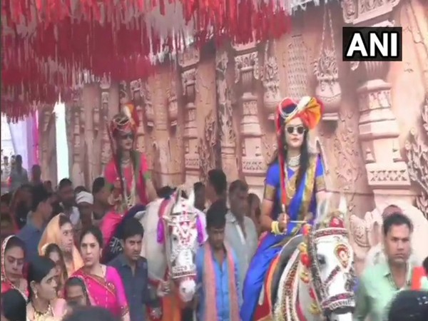 Two sisters take out their own 'baraat' in Madhya Pradesh. Photo/ANI