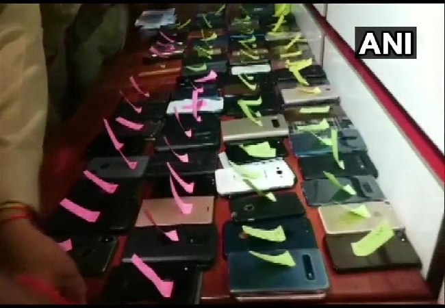 Mobile phones of officials kept outside during law and order review meeting in Lucknow, Uttar Pradesh on Wednesday. Photo/ANI