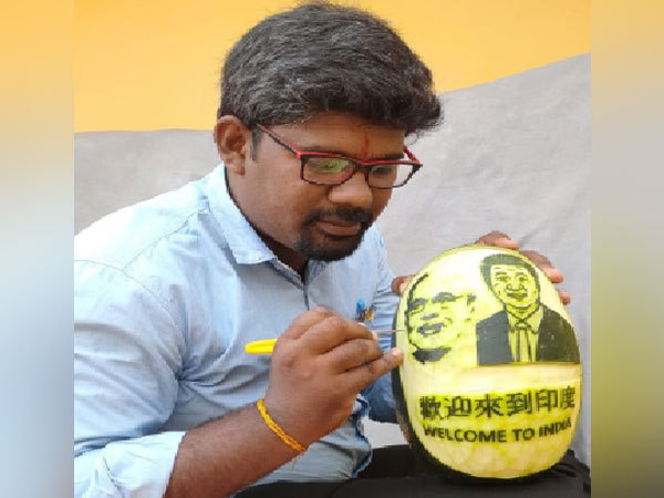 M Elanchezian-the artist who carved images of Prime Minister Narendra Modi and Chinese President Xi Jinping on watermelon.