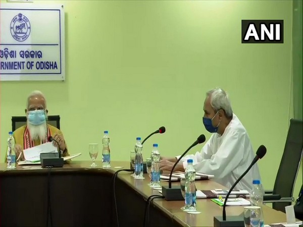 Prime Minister Narendra Modi and Odisha Chief Minister Naveen Patnaik during the review meeting today. (Photo/ ANI)