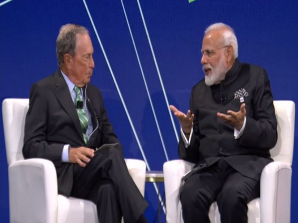 Prime Minister Narendra Modi interacting with Michael Bloomberg at the Bloomberg Global Business Forum in New York. (Photo/ANI)